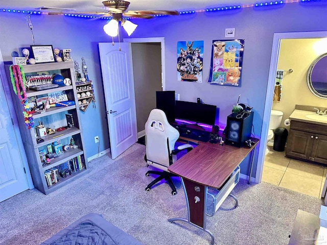 2924 Sundance Ln, Cantonment, FL 32533 - carpeted home office with ceiling fan and a sink