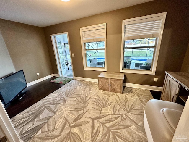 2924 Sundance Ln, Cantonment, FL 32533 - bedroom featuring baseboards and wood finished floors