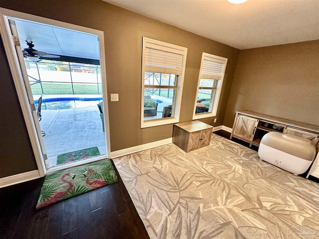 2924 Sundance Ln, Cantonment, FL 32533 - doorway to outside with baseboards and wood finished floors