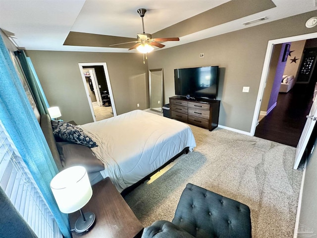 2924 Sundance Ln, Cantonment, FL 32533 - bedroom with a raised ceiling, carpet floors, and ceiling fan