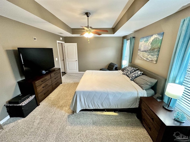 2924 Sundance Ln, Cantonment, FL 32533 - bedroom with carpet flooring, a raised ceiling, and a ceiling fan