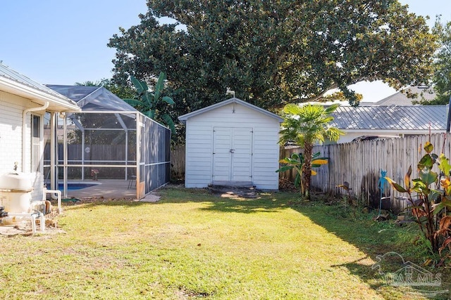 view of yard featuring glass enclosure