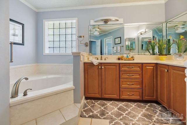 bathroom featuring vanity, a bathtub, crown molding, tile patterned flooring, and ceiling fan