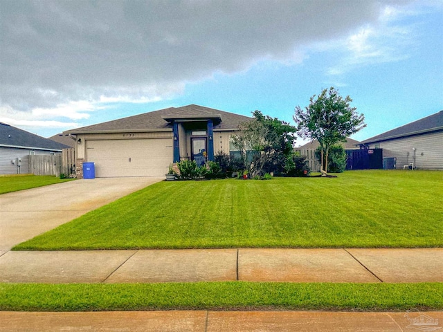 6135 Redberry Dr, Gulf Breeze, FL 32563 - view of front of property with driveway, an attached garage, and roof with shingles