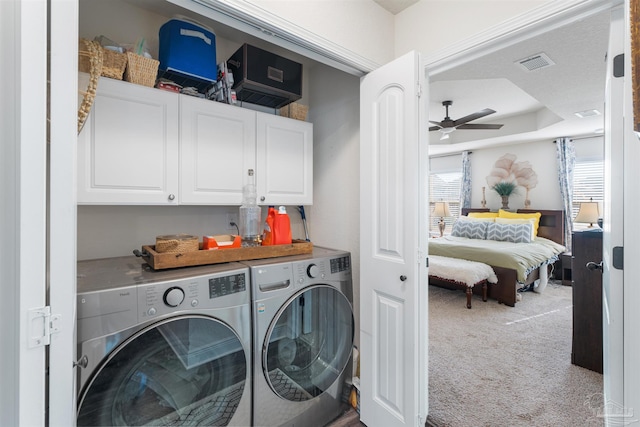 6135 Redberry Dr, Gulf Breeze, FL 32563 - washroom featuring washer and clothes dryer, cabinet space, carpet floors, and ceiling fan