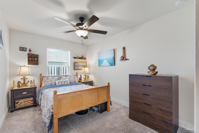 6135 Redberry Dr, Gulf Breeze, FL 32563 - carpeted bedroom with baseboards and a ceiling fan