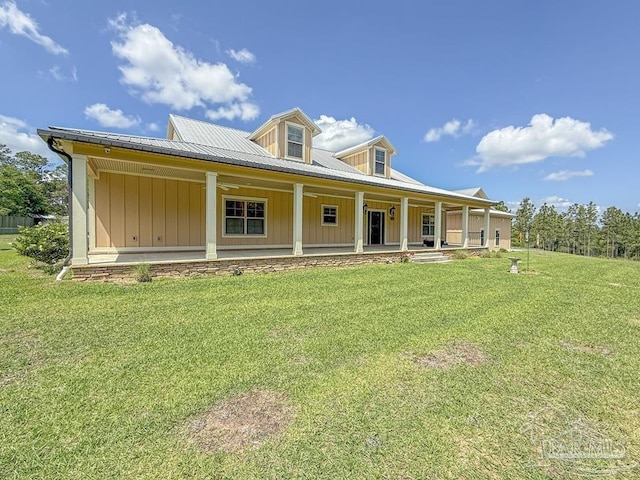 9873 Chumuckla Springs Rd, Jay, FL 32565 - rear view of property featuring a lawn and covered porch