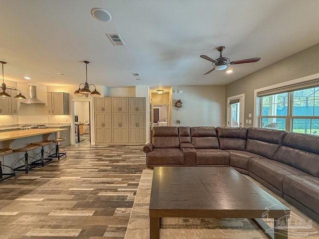 9873 Chumuckla Springs Rd, Jay, FL 32565 - living room featuring ceiling fan, dark wood finished floors, and visible vents