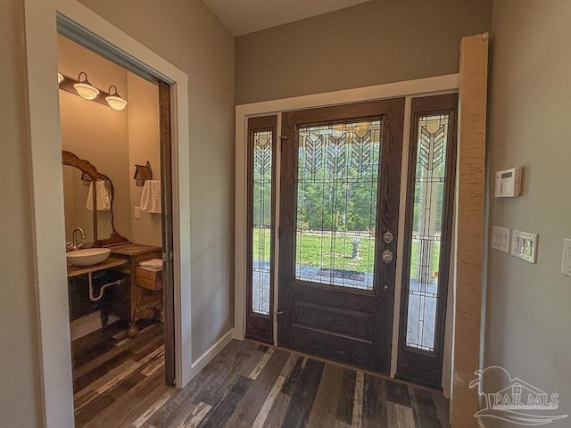 9873 Chumuckla Springs Rd, Jay, FL 32565 - entrance foyer with baseboards and dark wood-style floors