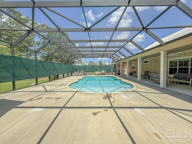 9873 Chumuckla Springs Rd, Jay, FL 32565 - view of swimming pool featuring a fenced in pool, glass enclosure, an outdoor living space, and a patio area