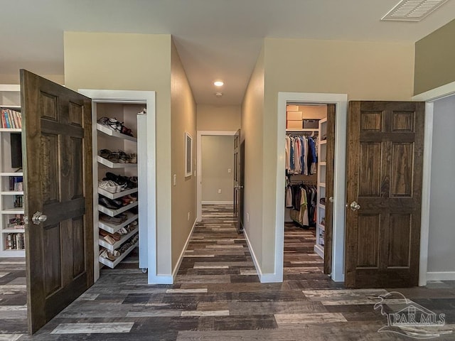 9873 Chumuckla Springs Rd, Jay, FL 32565 - hallway featuring recessed lighting, baseboards, visible vents, and dark wood finished floors