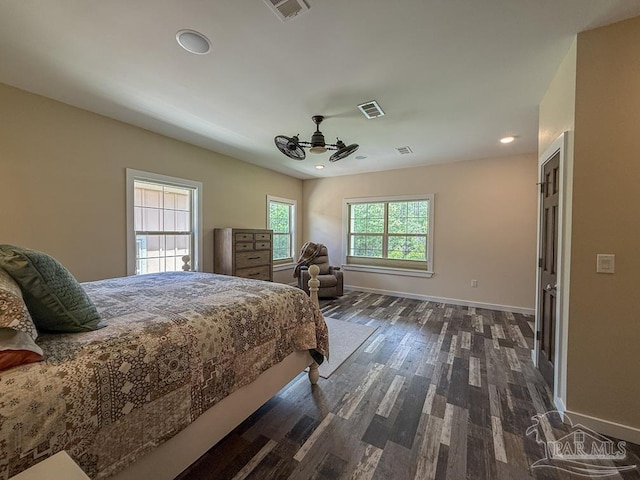 9873 Chumuckla Springs Rd, Jay, FL 32565 - bedroom with dark wood-style flooring, baseboards, visible vents, and recessed lighting