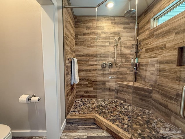 9873 Chumuckla Springs Rd, Jay, FL 32565 - bathroom with a tile shower and toilet