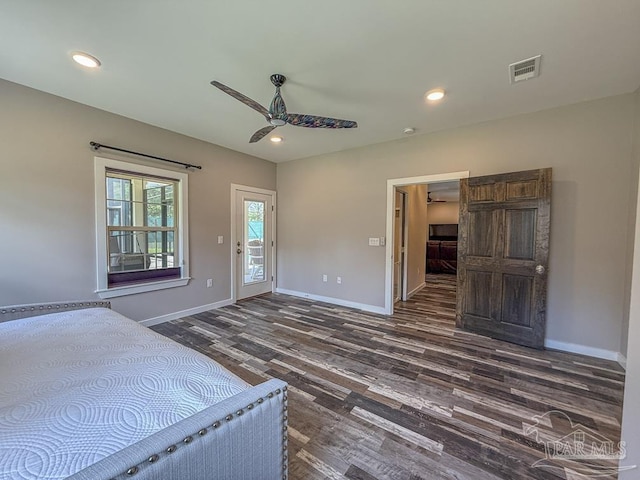9873 Chumuckla Springs Rd, Jay, FL 32565 - unfurnished bedroom featuring baseboards, visible vents, and dark wood-type flooring