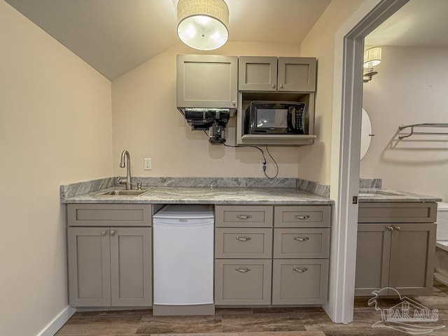 9873 Chumuckla Springs Rd, Jay, FL 32565 - kitchen with wood finished floors, gray cabinetry, a sink, and black microwave