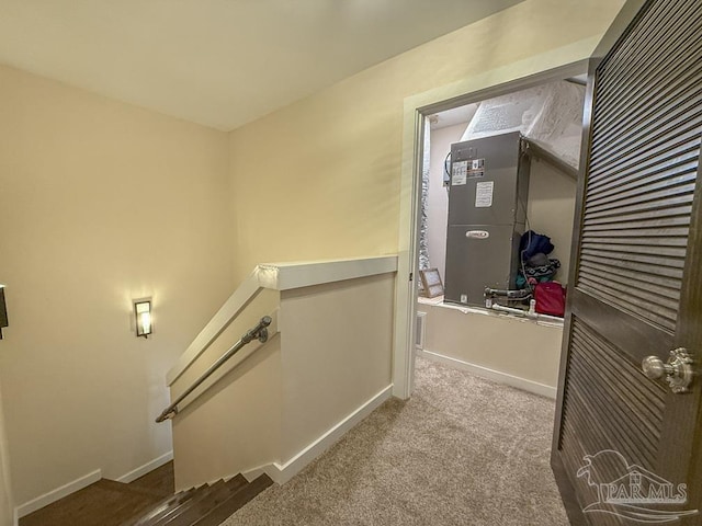 9873 Chumuckla Springs Rd, Jay, FL 32565 - corridor with baseboards, carpet flooring, and an upstairs landing
