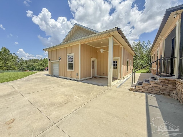 9873 Chumuckla Springs Rd, Jay, FL 32565 - rear view of property featuring a patio, ceiling fan, and board and batten siding