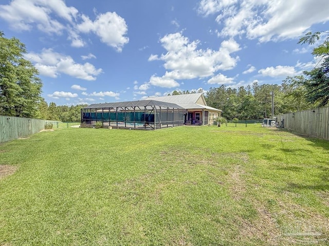 9873 Chumuckla Springs Rd, Jay, FL 32565 - view of yard featuring a fenced backyard, a swimming pool, and a lanai