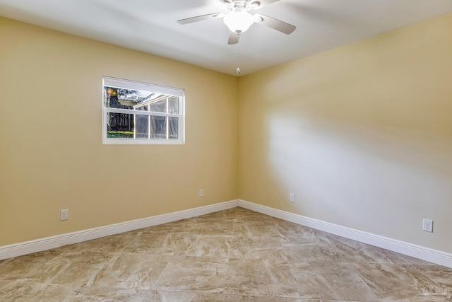 empty room featuring ceiling fan