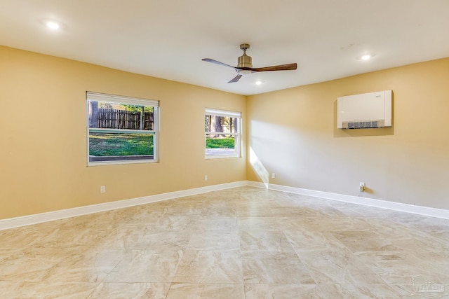 spare room featuring ceiling fan