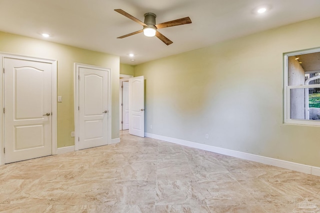 unfurnished bedroom with ceiling fan