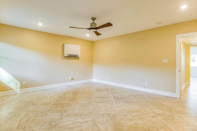 unfurnished room with ceiling fan