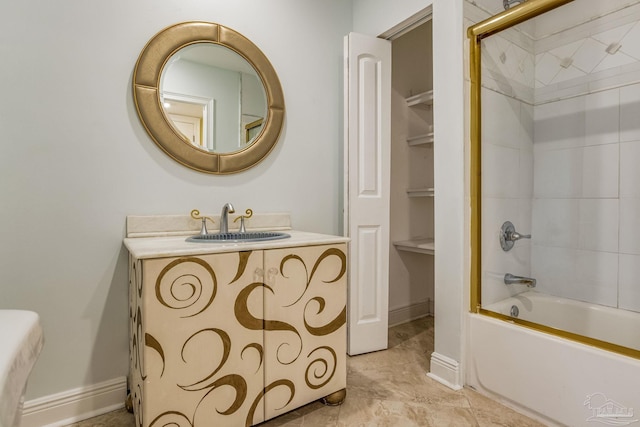 bathroom featuring vanity and bath / shower combo with glass door