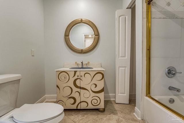 full bathroom featuring toilet, combined bath / shower with glass door, and vanity