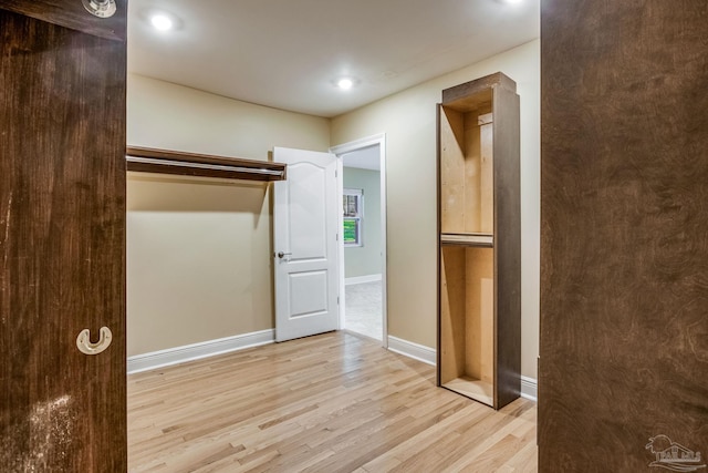 hallway featuring light hardwood / wood-style floors