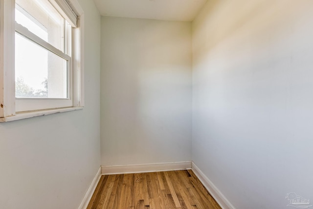 unfurnished room featuring wood-type flooring