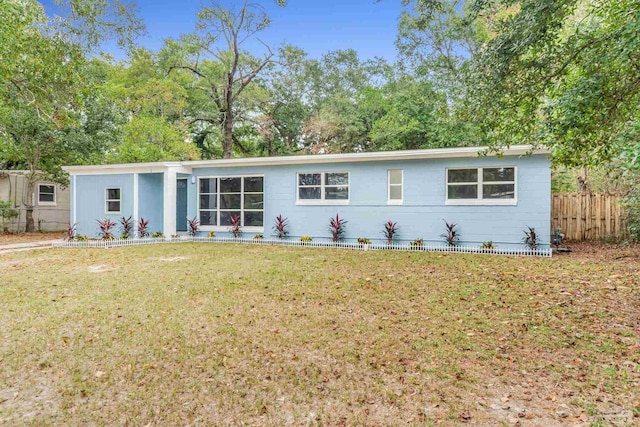 single story home with a front yard