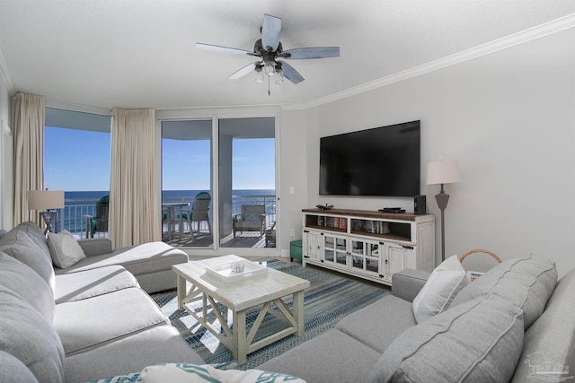 living room featuring floor to ceiling windows, crown molding, and ceiling fan