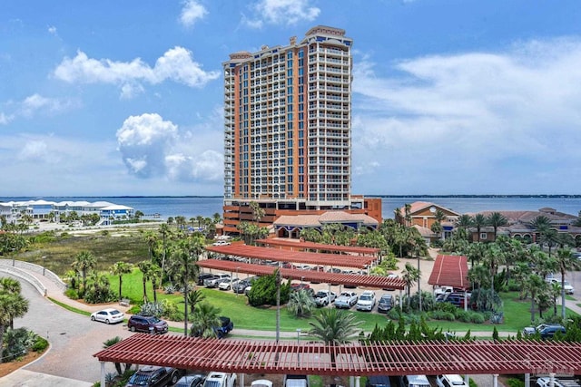 birds eye view of property with a water view