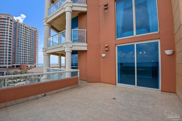 view of patio with a balcony