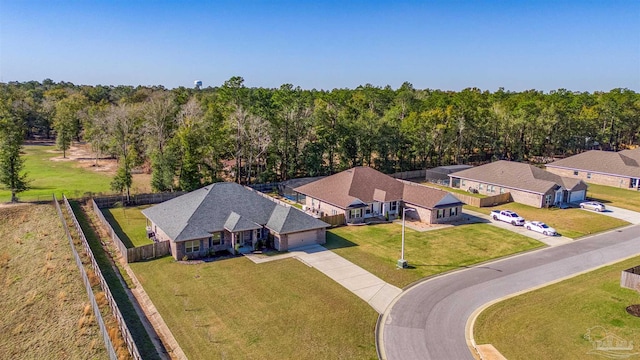 drone / aerial view with a view of trees