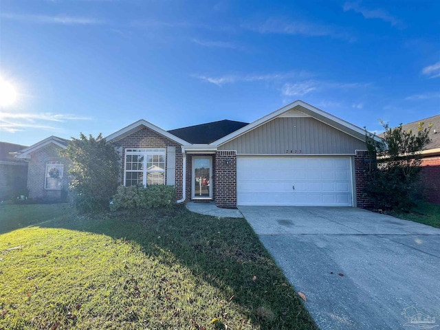 single story home with a garage and a front lawn