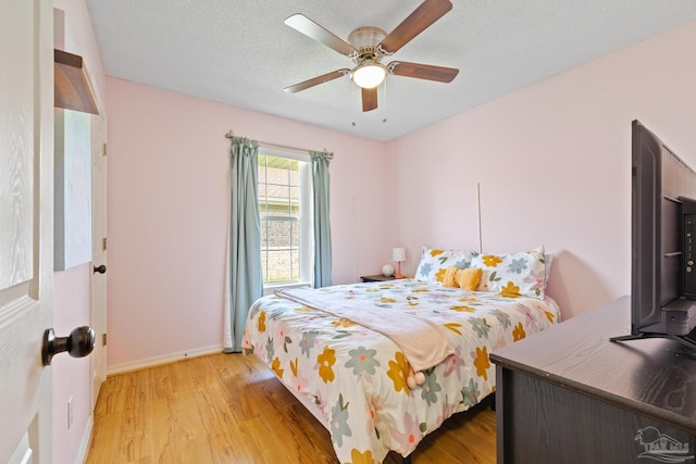 1307 Mazurek Blvd, Pensacola, FL 32514 - bedroom with wood finished floors, baseboards, and ceiling fan