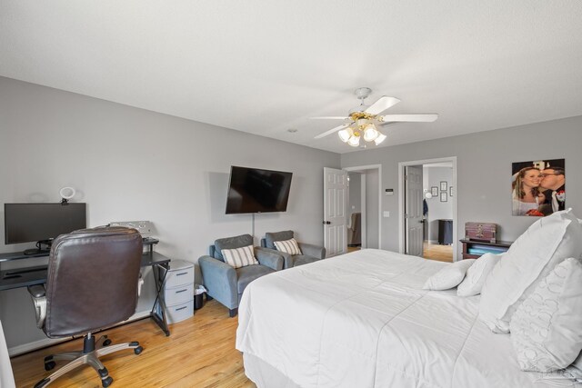 1307 Mazurek Blvd, Pensacola, FL 32514 - bedroom featuring light wood finished floors, a desk, and a ceiling fan