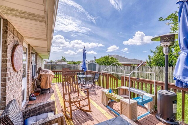 1307 Mazurek Blvd, Pensacola, FL 32514 - deck featuring a fenced backyard and outdoor dining area