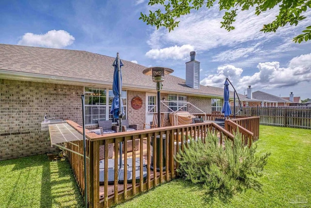 1307 Mazurek Blvd, Pensacola, FL 32514 - back of property with brick siding, a deck, roof with shingles, and a chimney