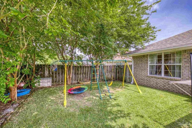 1307 Mazurek Blvd, Pensacola, FL 32514 - view of yard with a playground