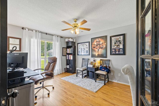 1307 Mazurek Blvd, Pensacola, FL 32514 - office featuring ceiling fan, a textured ceiling, baseboards, and wood finished floors