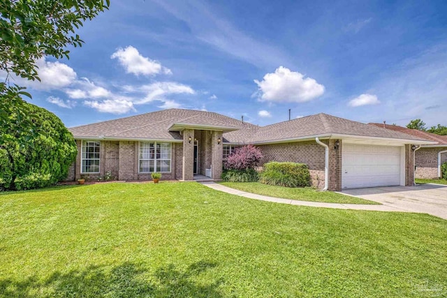 1307 Mazurek Blvd, Pensacola, FL 32514 - single story home with a garage, brick siding, concrete driveway, a front yard, and roof with shingles