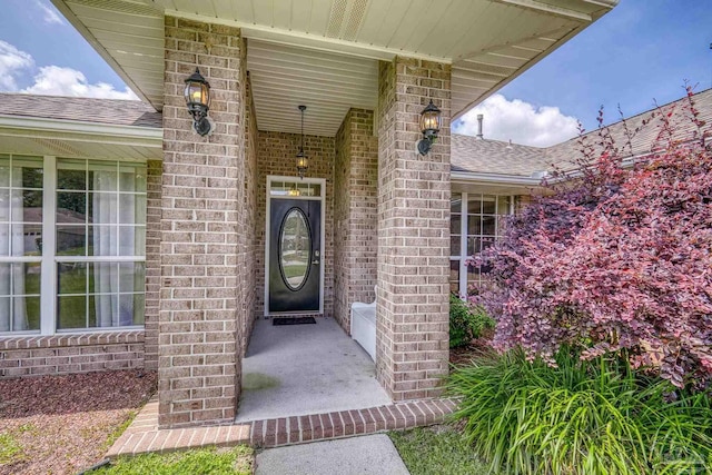 1307 Mazurek Blvd, Pensacola, FL 32514 - entrance to property featuring a shingled roof and brick siding