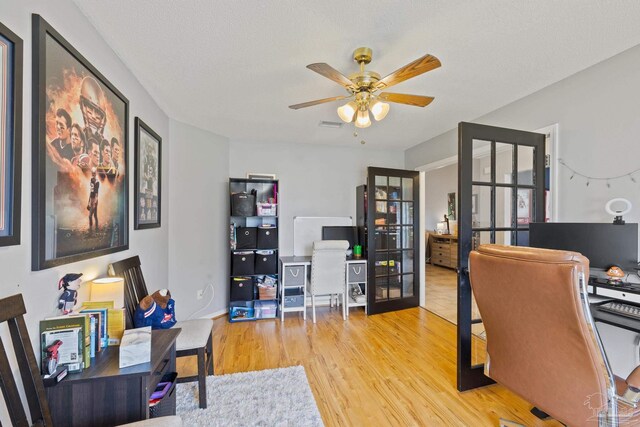 1307 Mazurek Blvd, Pensacola, FL 32514 - office area with ceiling fan, wood finished floors, and french doors