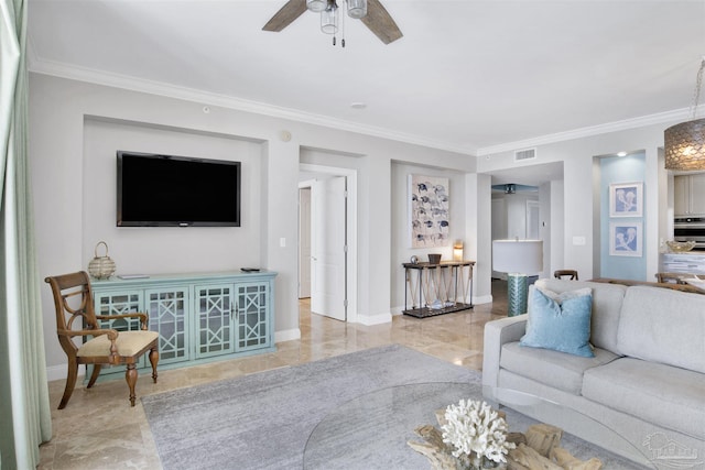 living room featuring crown molding and ceiling fan