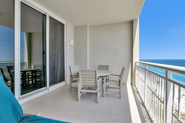 balcony featuring a water view