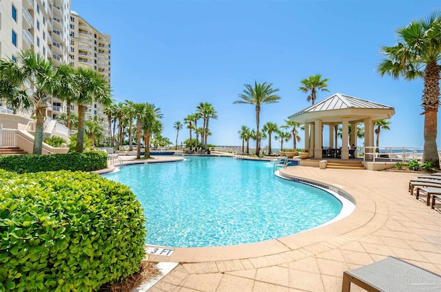 view of pool with a gazebo and a patio area