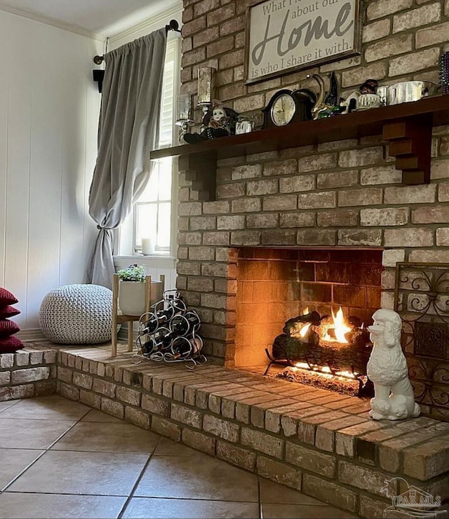 interior details with a fireplace and crown molding