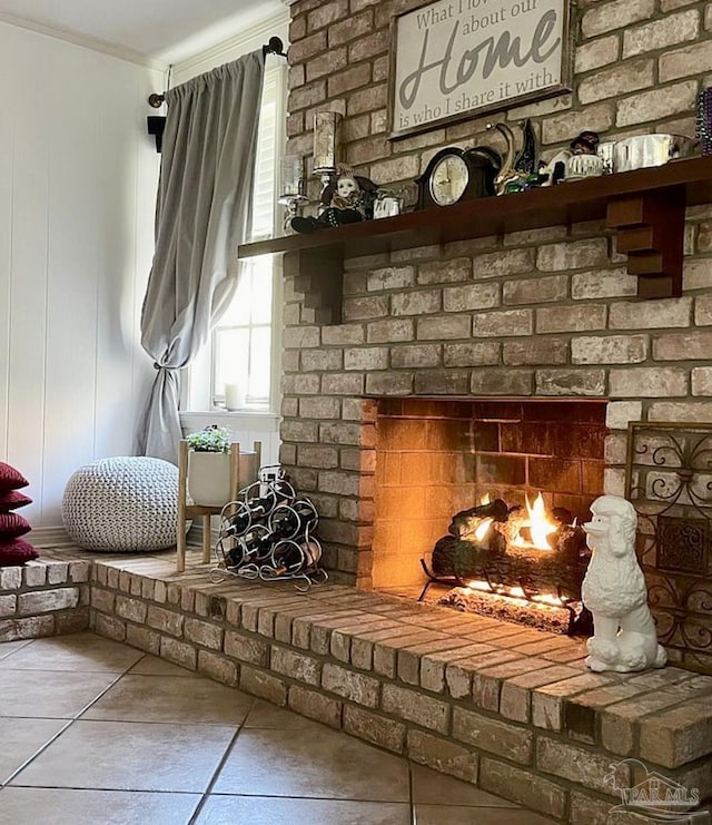 details with a fireplace and ornamental molding